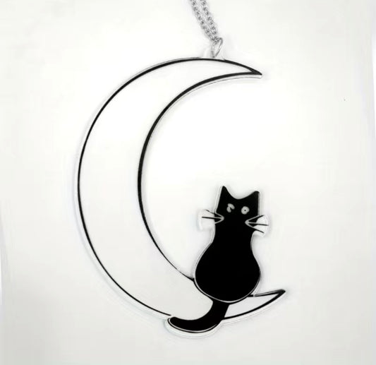 Cat on moon window hanging